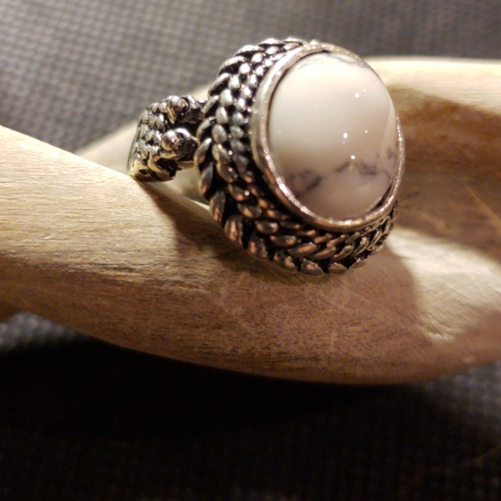 Silver color with white stone ring